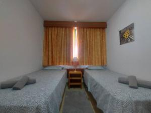 Postel nebo postele na pokoji v ubytování Monteparaiso Seaview 1104