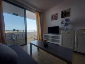 TV a/nebo společenská místnost v ubytování Monteparaiso Seaview 1104