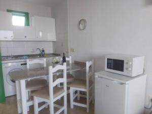 Kuchyň nebo kuchyňský kout v ubytování Monteparaiso Seaview 1104