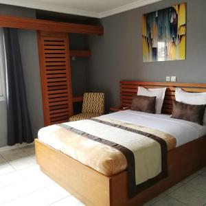 Postel nebo postele na pokoji v ubytování Hotel Astoria