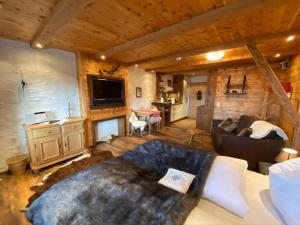 Гостиная зона в Alpenauszeit im Zirbenholz Chalet