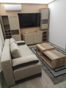 TV a/nebo společenská místnost v ubytování Aurora