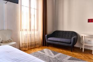 Postel nebo postele na pokoji v ubytování Al Cavour 34