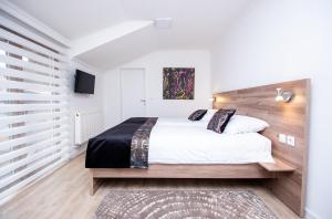 Postel nebo postele na pokoji v ubytování Guesthouse Bebek + 19 fotografií