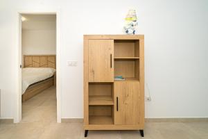 Postel nebo postele na pokoji v ubytování Mimosa