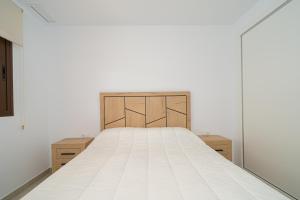 Postel nebo postele na pokoji v ubytování Mimosa
