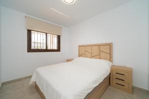 Postel nebo postele na pokoji v ubytování Mimosa