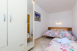Posteľ alebo postele v izbe v ubytovaní Orka Apartments