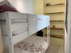 Posteľ alebo postele v izbe v ubytovaní VUE SUR LES ILES D'OR