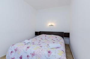 Posteľ alebo postele v izbe v ubytovaní Orka Apartments