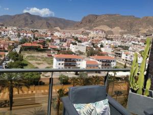 a balcony with a view of a city at Ático de lujo en el centro in Aguadulce