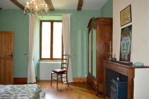 Postel nebo postele na pokoji v ubytování DUC MANOIR Chambres d'hôtes
