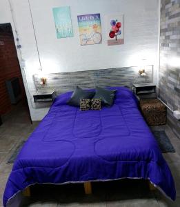 Säng eller sängar i ett rum på Cabaña La Nena