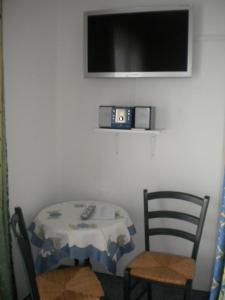 Televízia a/alebo spoločenská miestnosť v ubytovaní Appartement Gundi Ripper
