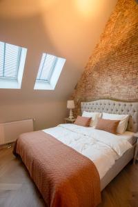 Een bed of bedden in een kamer bij Luxe appartementen Havenzicht