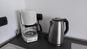 Comodidades para preparar café e chá em Appartamenti Casa San Nicolò