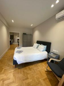 A bed or beds in a room at Optimal Point Még 3 kép
