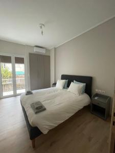 A bed or beds in a room at Optimal Point