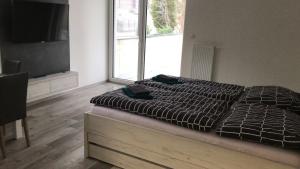 Postel nebo postele na pokoji v ubytování Apartmán Lipno