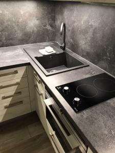 Dapur atau dapur kecil di Apartmán Lipno