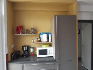 A kitchen or kitchenette at Gîte des Gardiens de Phare