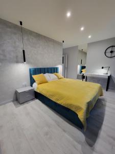 Posteľ alebo postele v izbe v ubytovaní Luksusowy apartament na Starym Miescie
