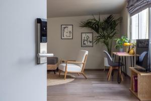 TV a/nebo společenská místnost v ubytování Arcade Hotel Athens