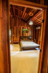 a bedroom with two beds in a room at Sitio Bom Tempo in Miguel Pereira