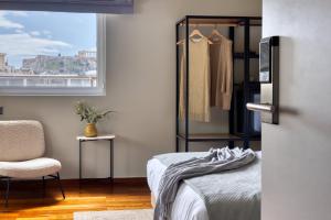 Postel nebo postele na pokoji v ubytování Arcade Hotel Athens