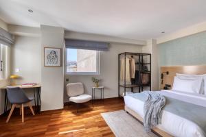 Postel nebo postele na pokoji v ubytování Arcade Hotel Athens