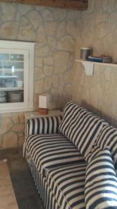 Posteľ alebo postele v izbe v ubytovaní MAJA Stone House