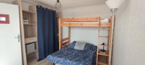 Postel nebo postele na pokoji v ubytování Appartement 2 chambres avec vue au pied des pistes