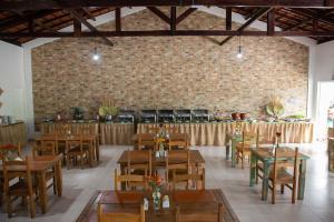 מסעדה או מקום אחר לאכול בו ב-Hotel Fazenda Vale da Cachoeira