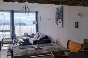 Posezení v ubytování Appartement 2 chambres avec vue au pied des pistes