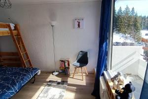 Postel nebo postele na pokoji v ubytování Appartement 2 chambres avec vue au pied des pistes