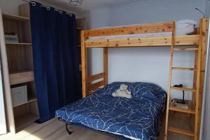 Postel nebo postele na pokoji v ubytování Appartement 2 chambres avec vue au pied des pistes
