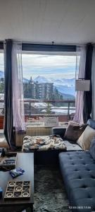 Posezení v ubytování Appartement 2 chambres avec vue au pied des pistes