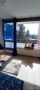 Posezení v ubytování Appartement 2 chambres avec vue au pied des pistes