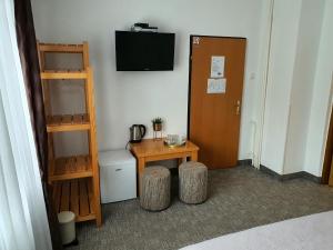TV a/nebo společenská místnost v ubytování Guesthouse Kovačević