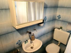 Koupelna v ubytování Guesthouse Kovačević + 37 fotografií