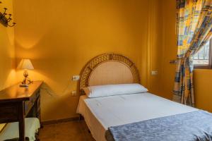 Postel nebo postele na pokoji v ubytování Casas rurales Los Guerrero B