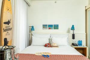 Postel nebo postele na pokoji v ubytování Yam Hotel - an Atlas Boutique Hotel