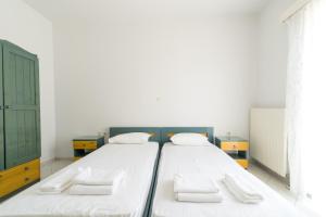Ένα ή περισσότερα κρεβάτια σε δωμάτιο στο SPIROS HOME