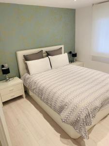 מיטה או מיטות בחדר ב-Casa Centro