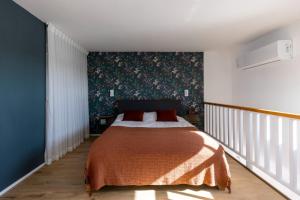 A bed or beds in a room at Gallerita