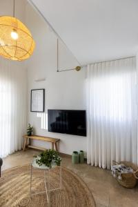 A television and/or entertainment centre at Gallerita