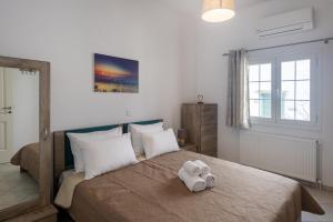 מיטה או מיטות בחדר ב-Parian Charming 3bedroom Home