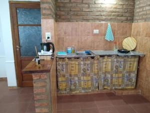 A kitchen or kitchenette at Departamento Güemes