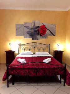 Giường trong phòng chung tại Il Girasole