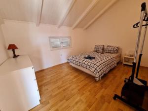 Postel nebo postele na pokoji v ubytování Prostorný domov v nejkrásnější části Chorvatska